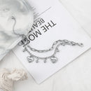 Pulseira corações eternizados personalizável com berloques - Em aço inoxidável - Grave 2 Nomes.